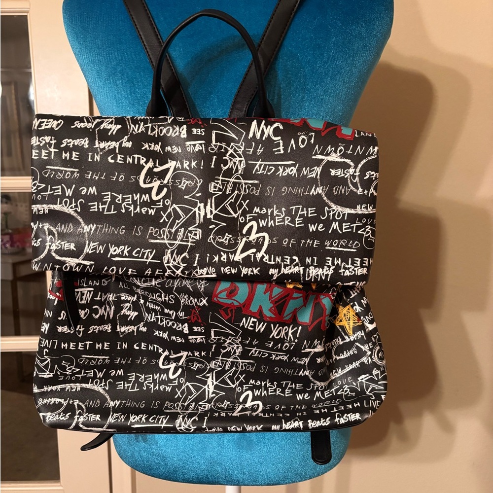 DKNY Black and White Graffiti Shoulder/backpack style bag.